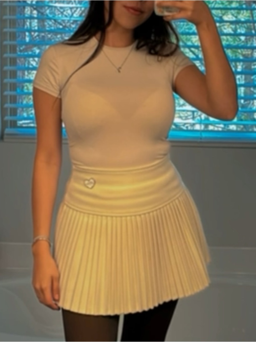 Cream pleated mini skirt